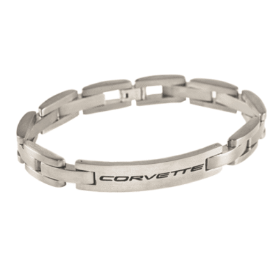 A sleek silver bracelet with rectangular links and "CORVETTE" engraved on a central plate, conveying a modern, automotive-inspired design.