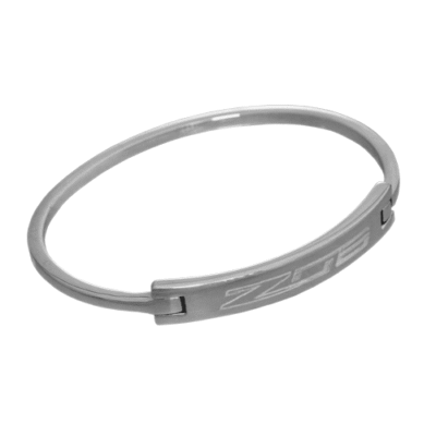 Silver bangle bracelet featuring an engraved "Z06" design. The band is sleek and shiny, conveying a modern, elegant style.