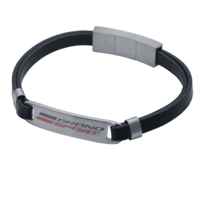 A sleek black bracelet featuring a silver clasp and a metallic plate with "Grand Sport" engraved in bold red and black text, giving a sporty feel.