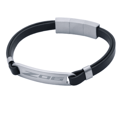 A sleek black leather bracelet with a metallic clasp and "Z06" engraved on a silver plate. Modern and sophisticated design, conveys elegance.