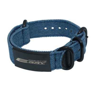 Blue denim wristband with a buckle, featuring "Corvette C6R" text in white on a black patch. It conveys a sporty and casual tone.