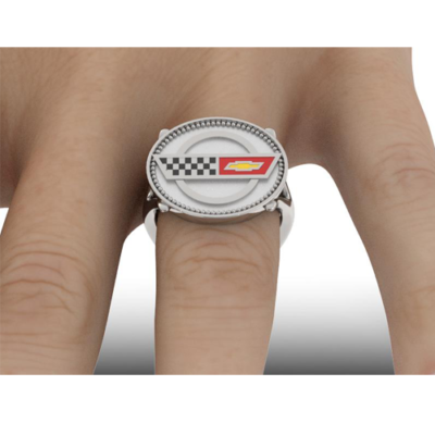 C4 Corvette ring on finger